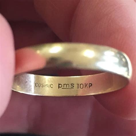 The 14kp markings mean that it is 14ct gold, the pms may be a number of things. . Pms 10kp ring